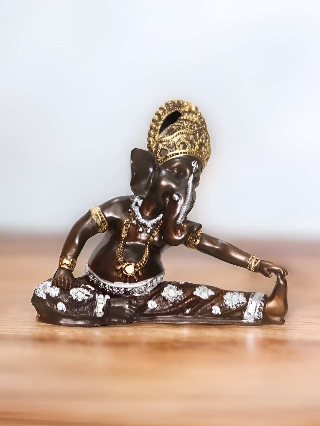 

BECKON VENTURE Brown & Gold Toned Religious Idol Showpiece