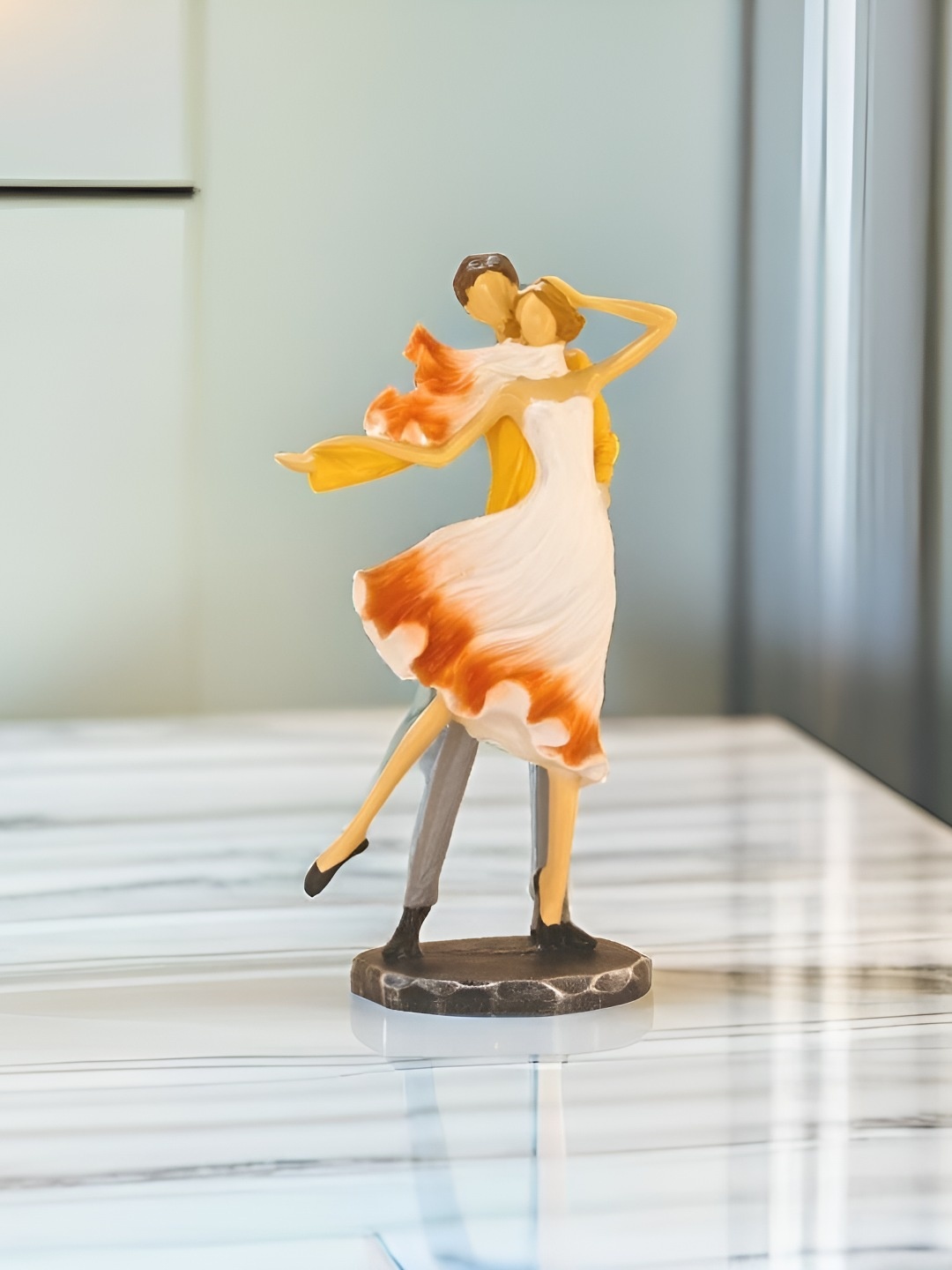 

BECKON VENTURE White & Orange Small Figurine Showpiece