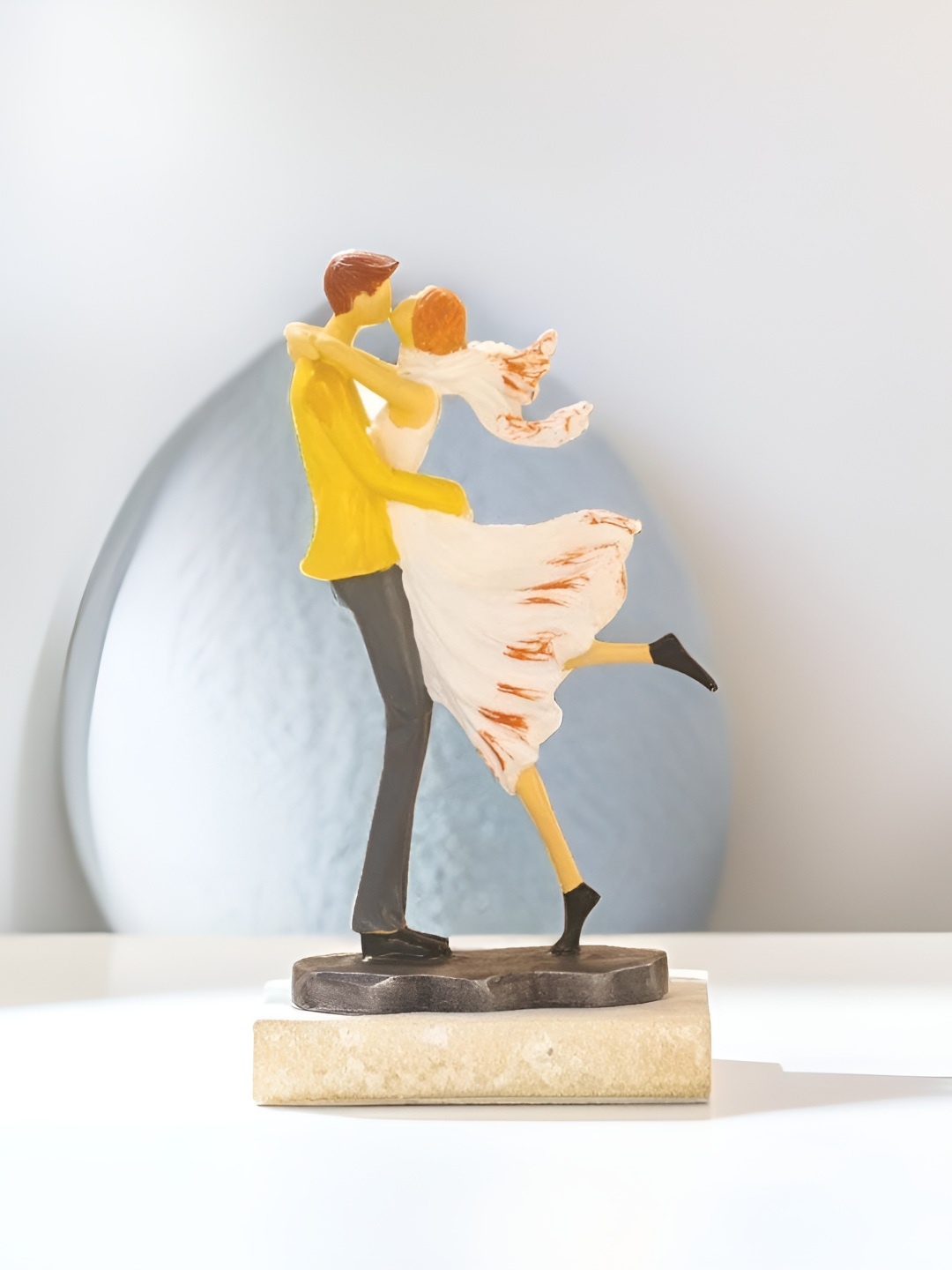 

BECKON VENTURE Yellow & White Medium Figurine Showpiece