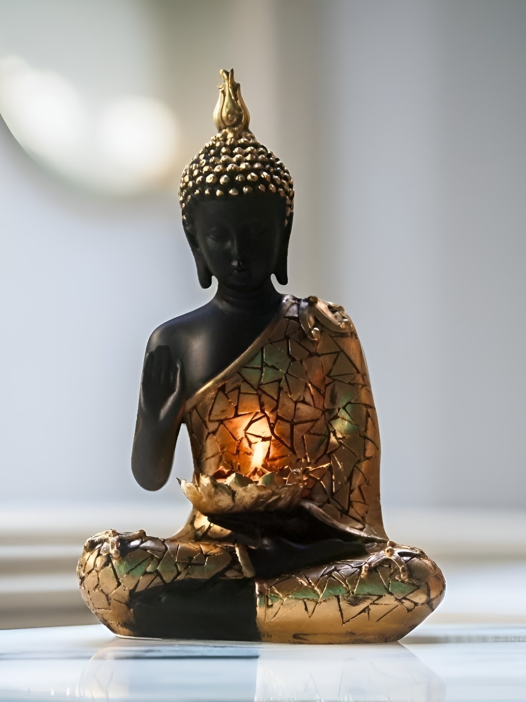 

BECKON VENTURE Gold toned & Black Buddha Idol Showpiece
