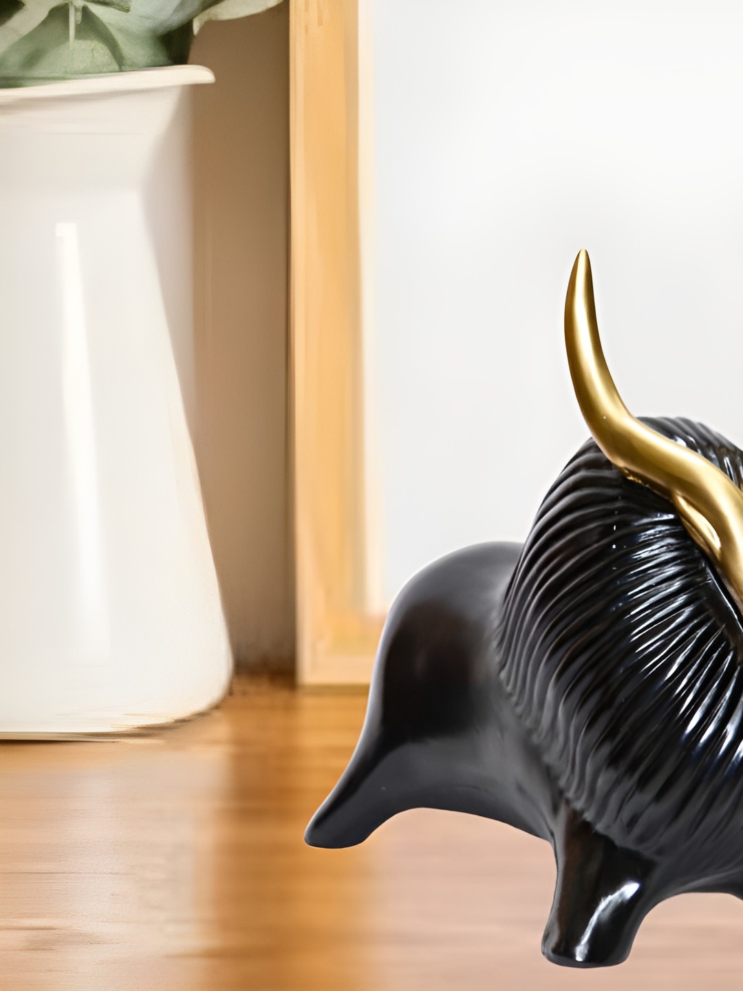 

BECKON VENTURE Black & Gold toned Animal Figurine Showpiece