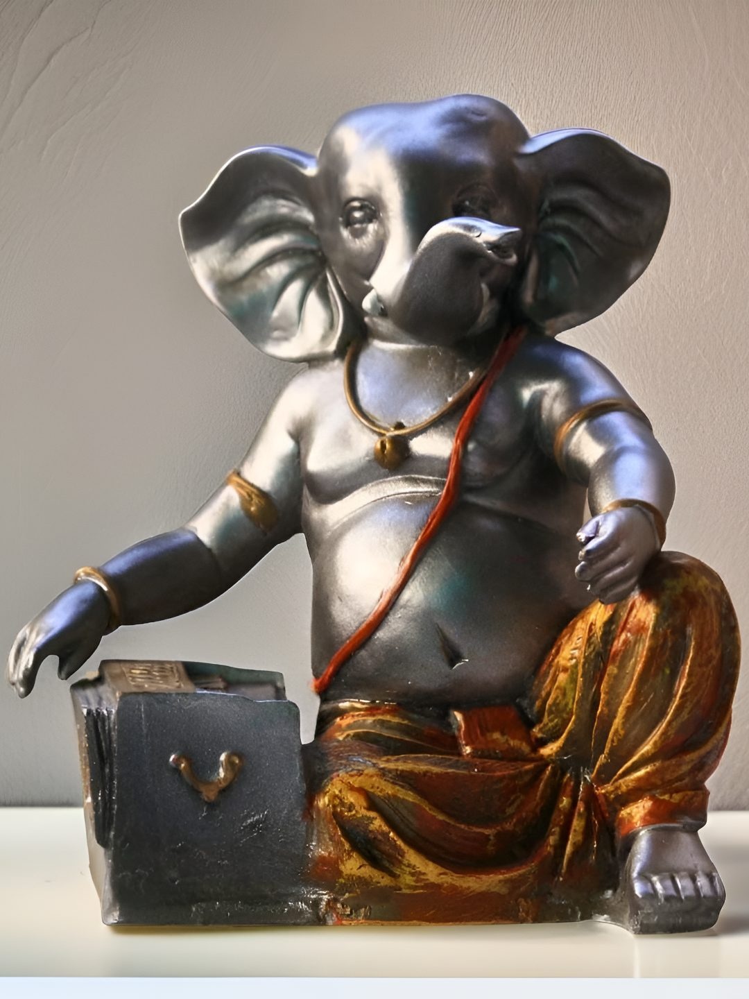 

BECKON VENTURE Gold-Toned & Silver Toned Lord Ganesha Idol Showpiece