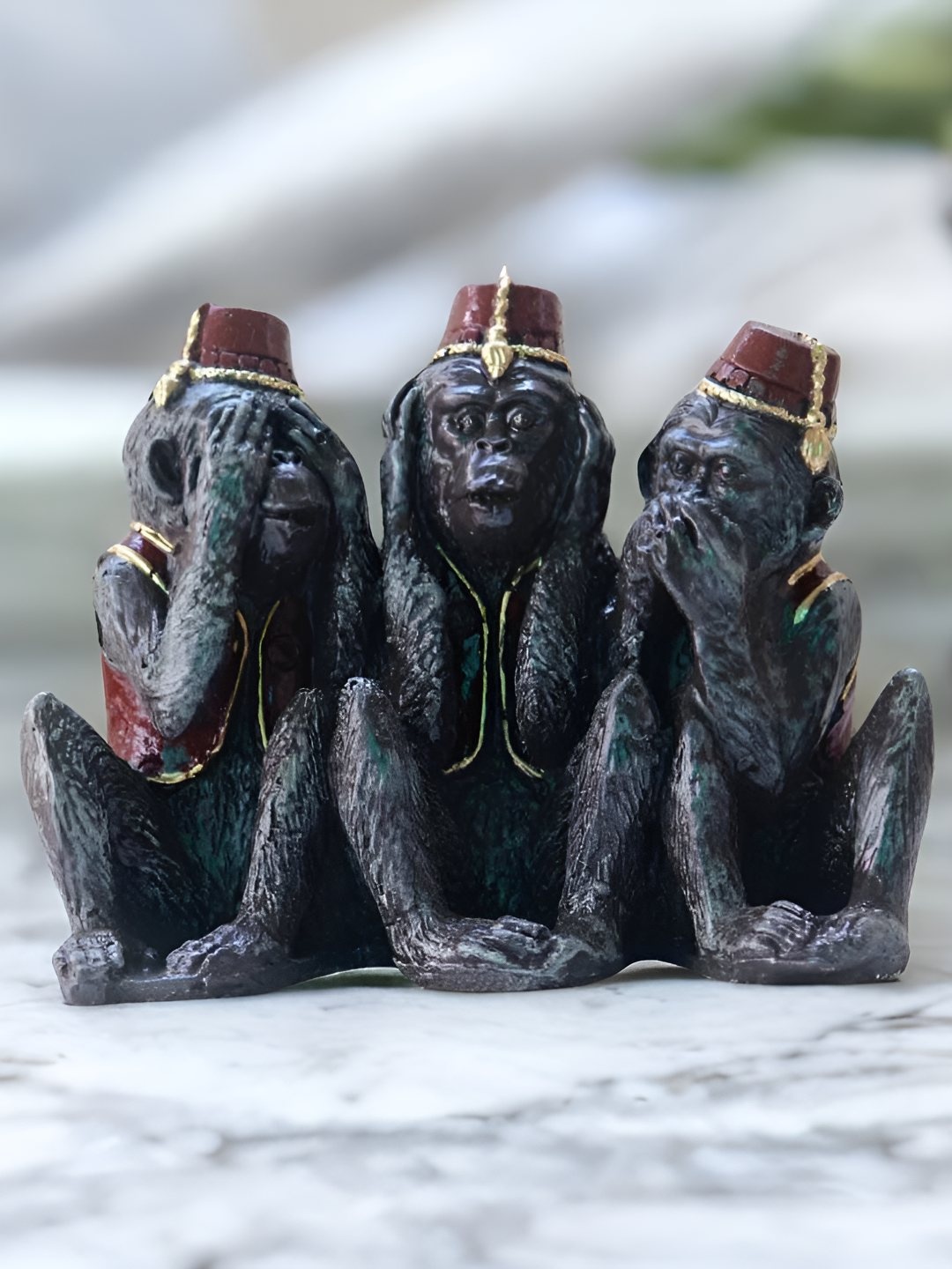 

BECKON VENTURE Grey & Maroon Monkeys Figurine Showpiece