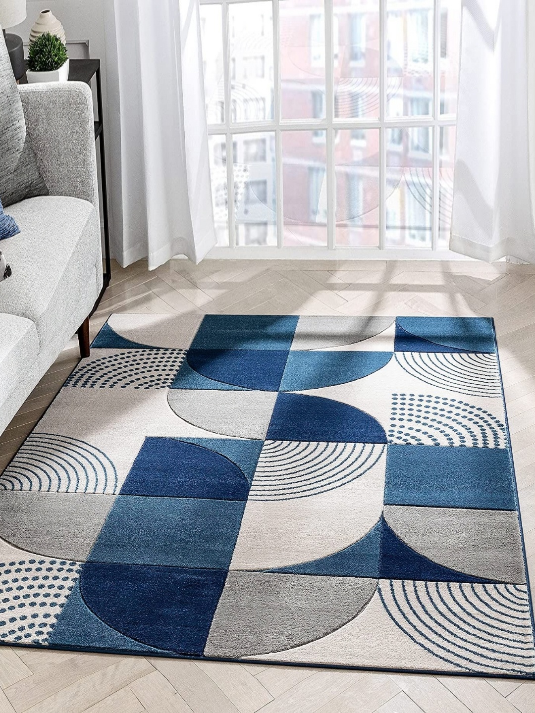 

Safiya Carpet Blue & White Geometric Printed Hand Tufted Woollen Carpet