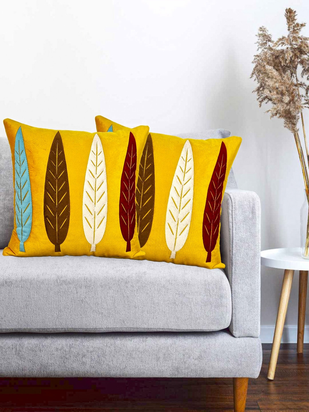 

Vinayaka Fab Yellow & Brown 2 Pieces Floral Patchwork Velvet Square Cushion Covers