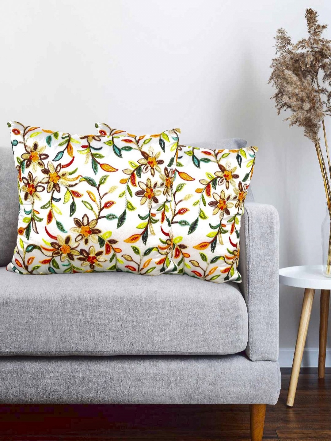 

Vinayaka Fab Cream Coloured & Yellow 2 Pieces Embroidered Silk Square Cushion Covers