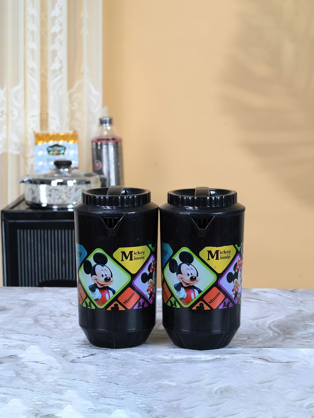 

Kuber Industries Black & Blue 2 Pieces Printed Water Jugs 2 L Each