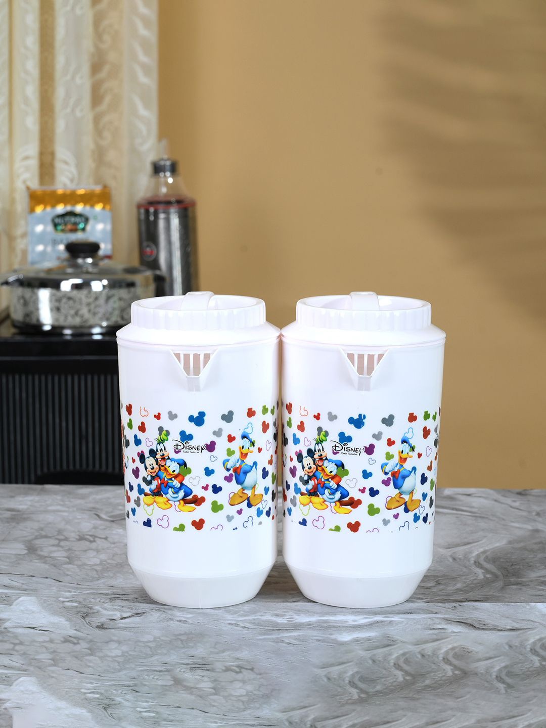 

Kuber Industries White & Blue 2 Pieces Printed Water Jugs 2 L Each