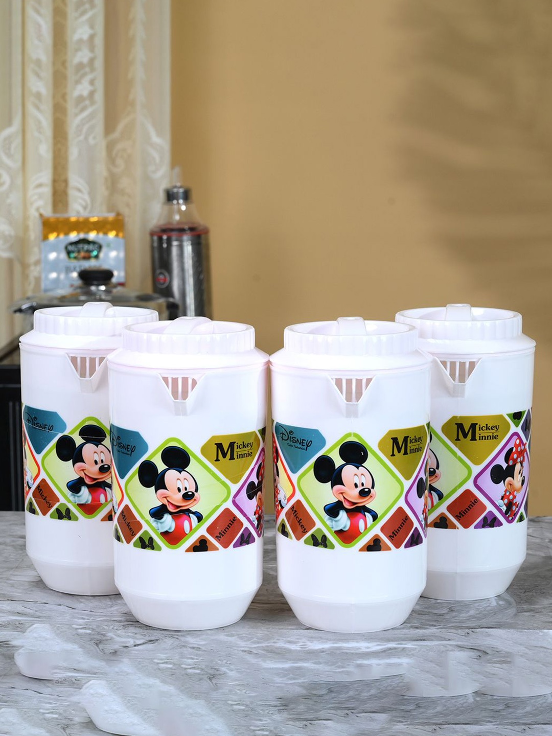 

Kuber Industries White & Blue 4 Pieces Printed Water Jugs 2L