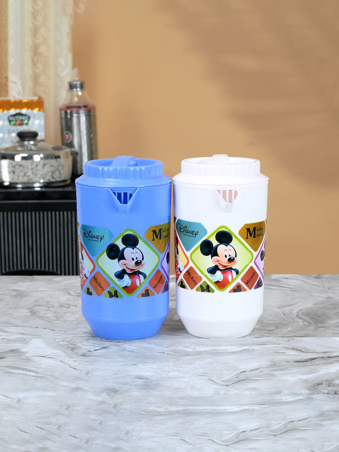 

Kuber Industries White & Blue 2 Pieces Printed Water Jugs 2L