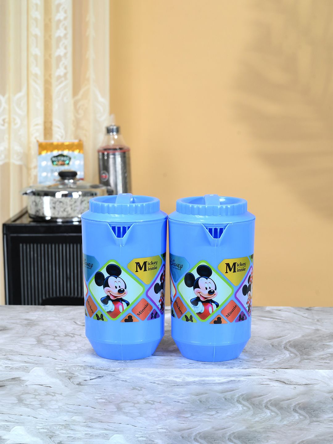 

Kuber Industries Blue & Red 2 Pieces Printed Water Jugs 2L