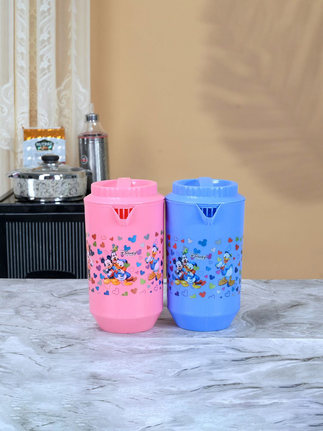 

Kuber Industries Pink & Blue 2 Pieces Printed Water Jugs 2L