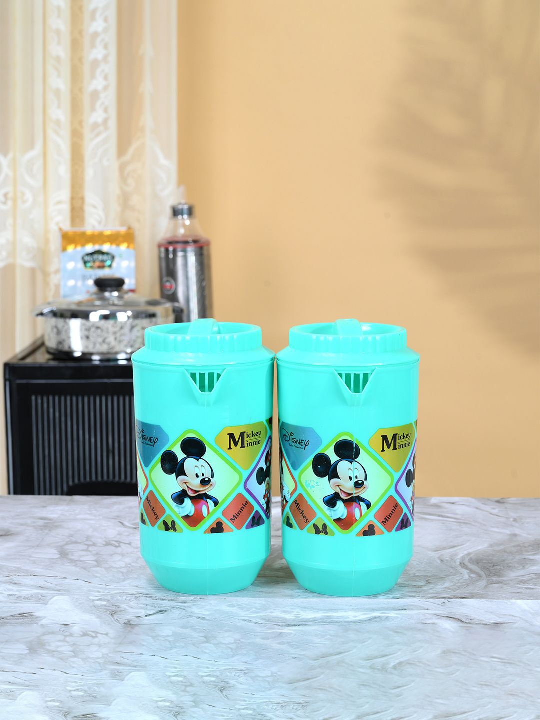 

Kuber Industries Green & Blue 2 Pieces Printed Water Jugs 2L