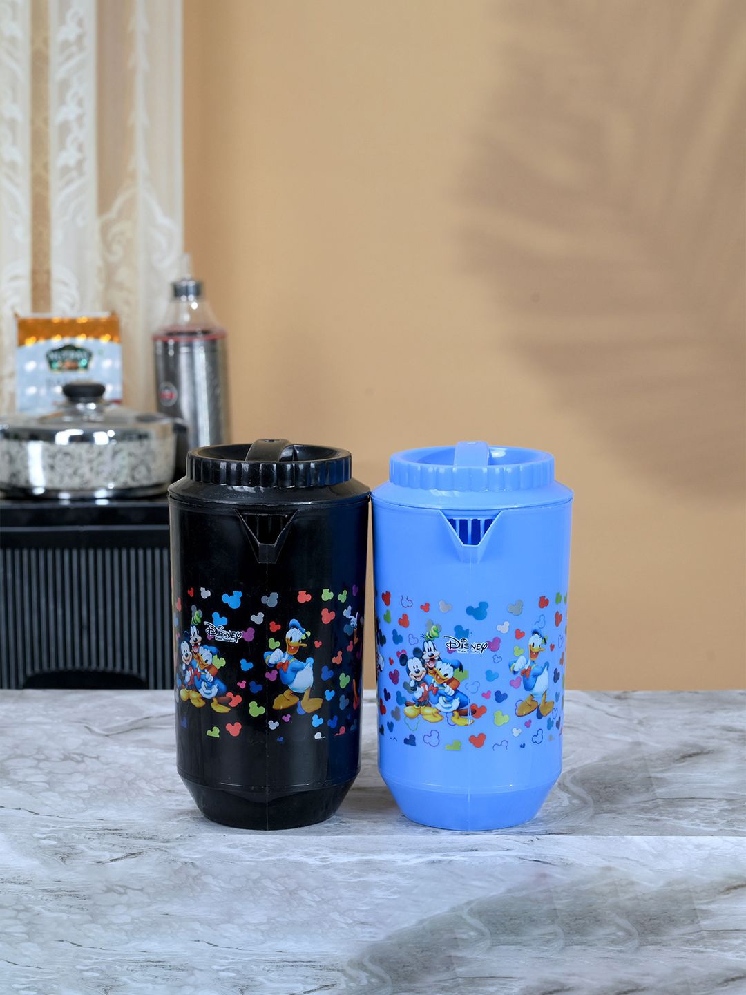 

Kuber Industries Black & Blue 2 Pieces Printed Water Jugs 2L