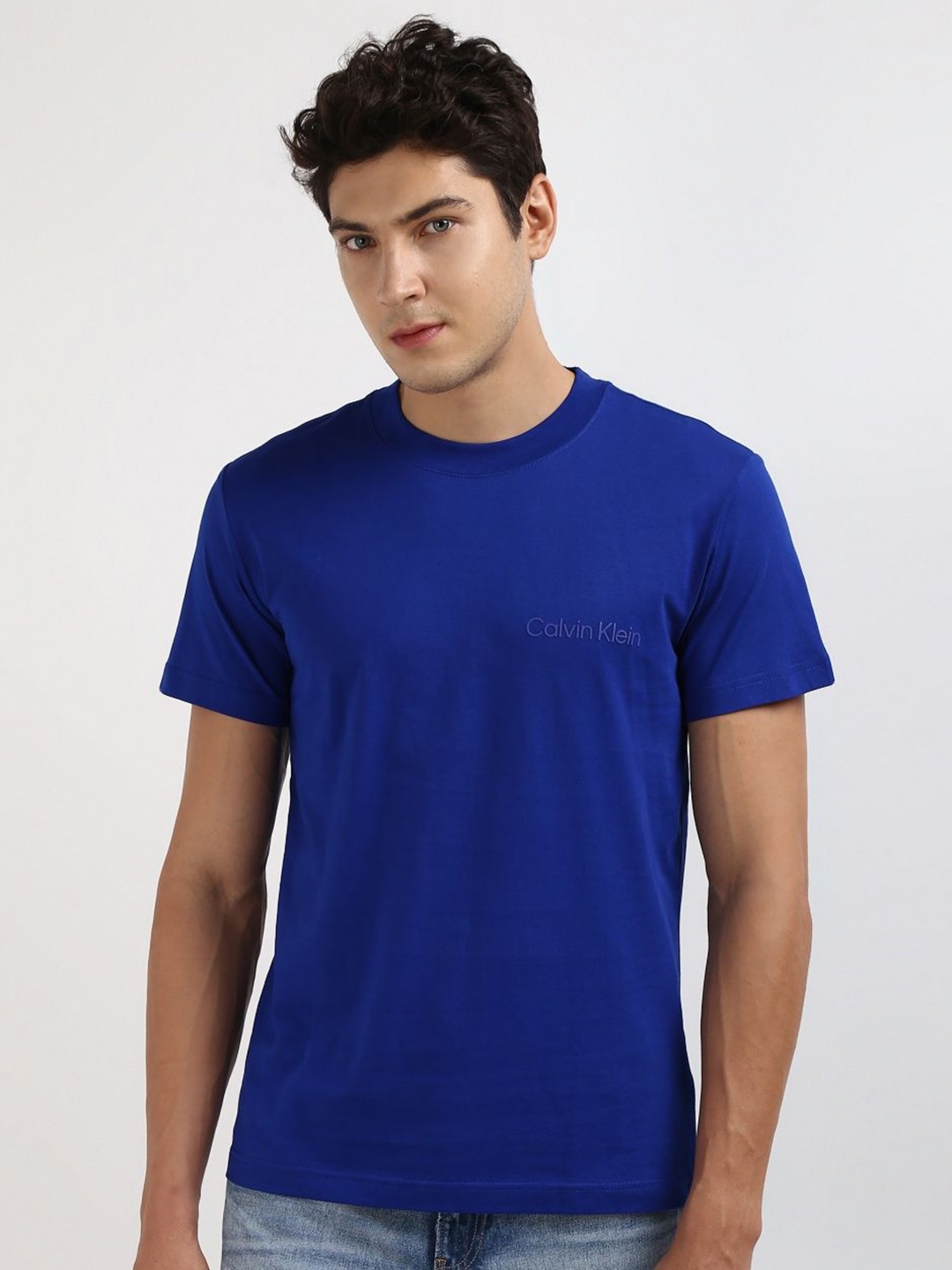 

Calvin Klein Jeans Men Solid Round neck Cotton T-shirt, Blue