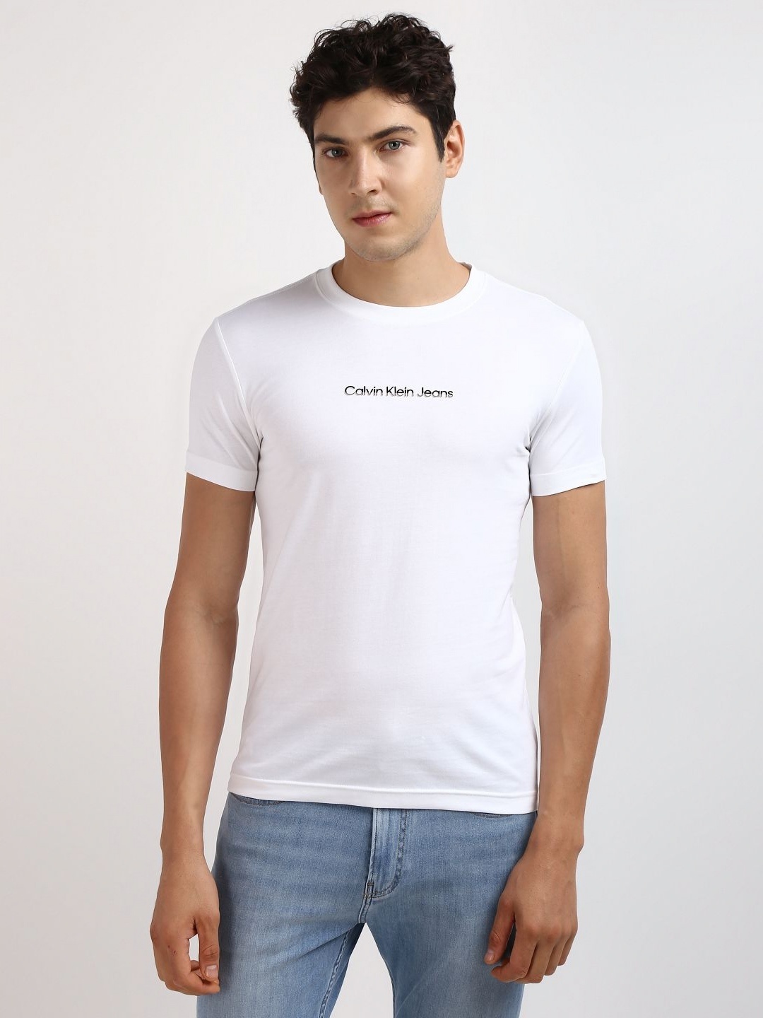 

Calvin Klein Jeans Men Solid Round neck Cotton T-shirt, White