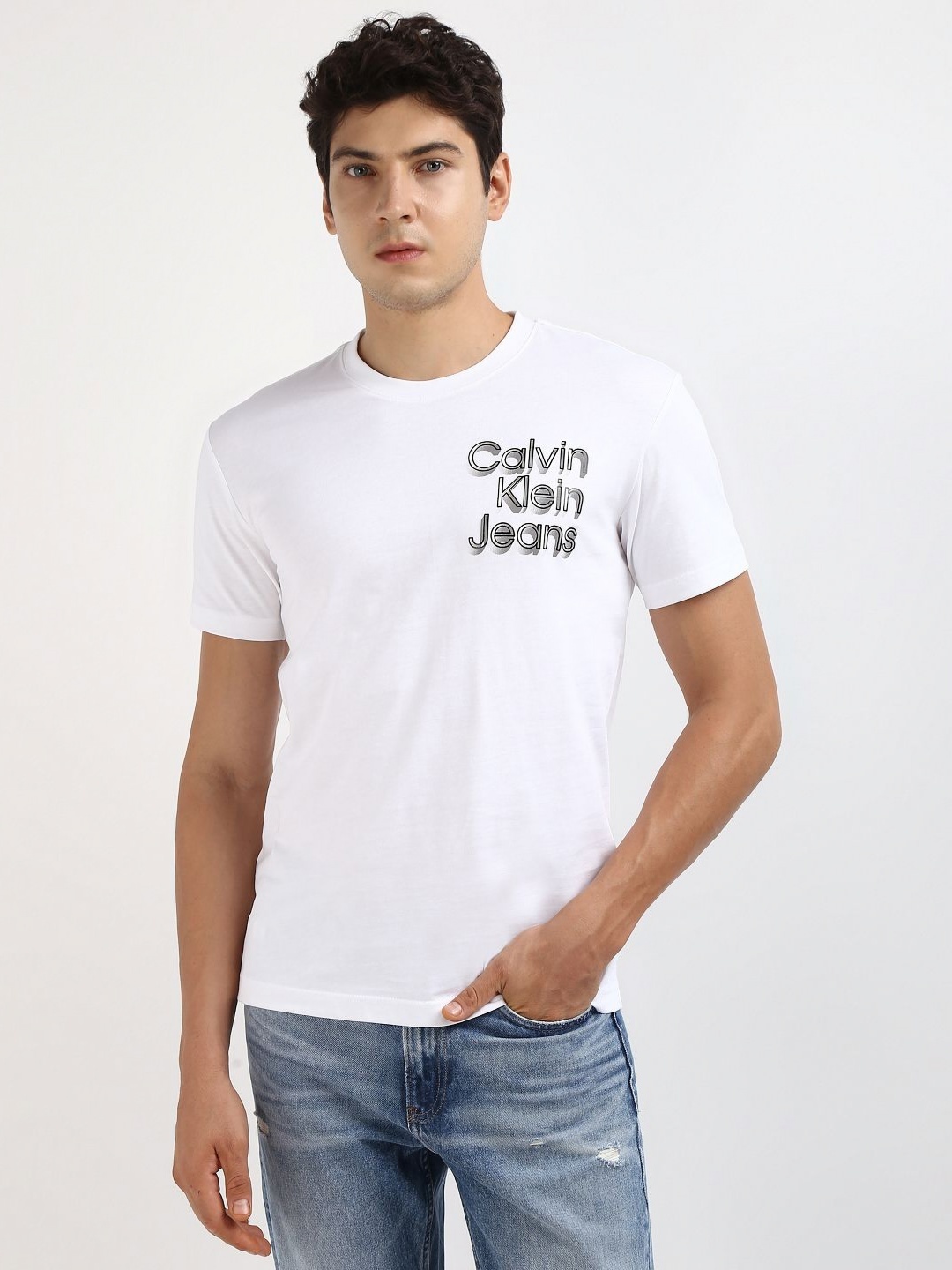

Calvin Klein Jeans Men Solid Round Neck Cotton T-shirt, White