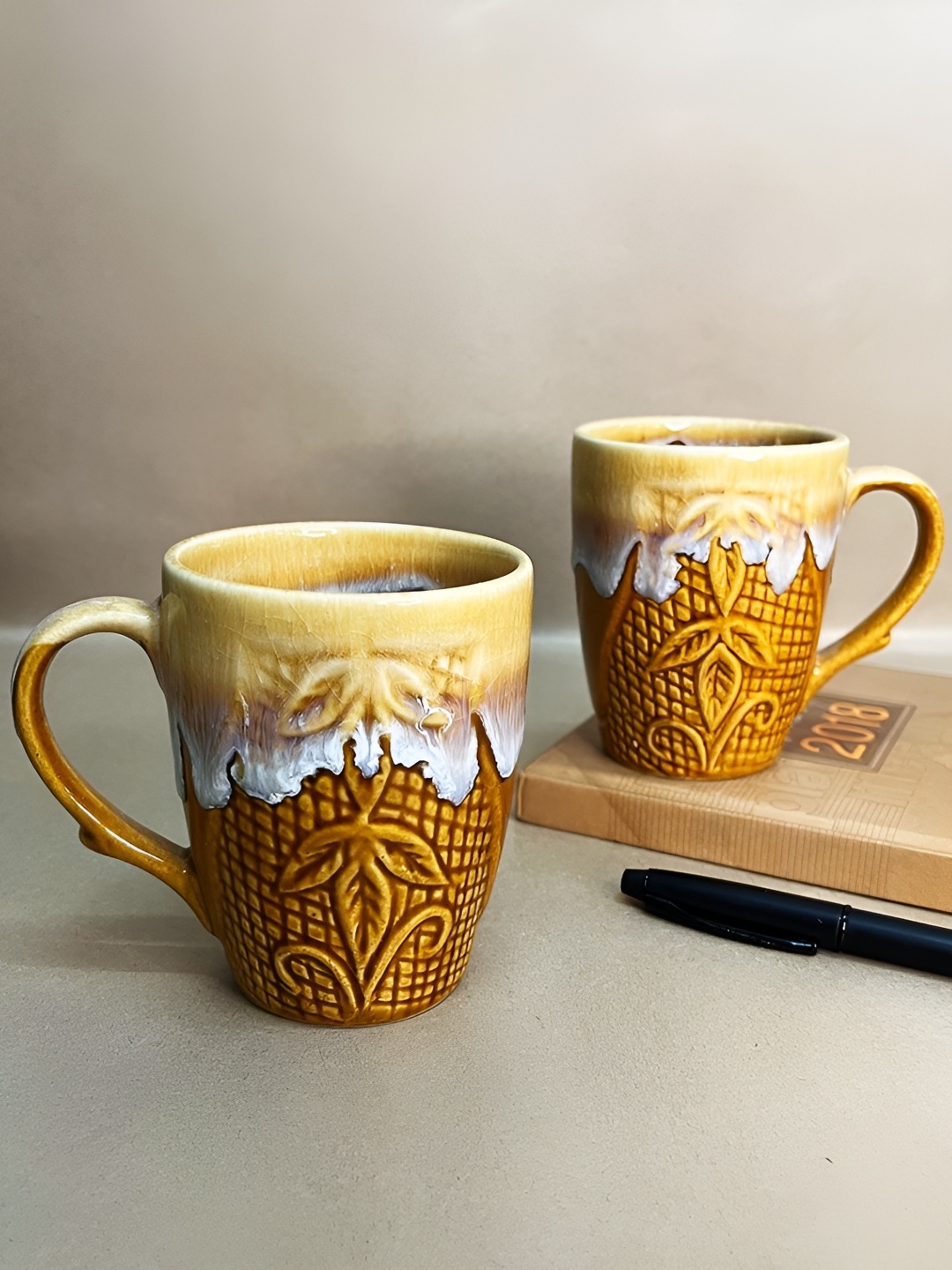 

The Artisan Emporium Yellow & White 2 Pieces Printed Glossy Ceramic Mugs 350 ml Each