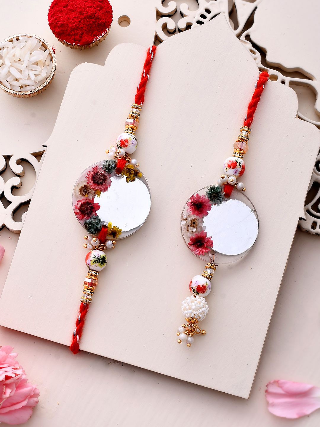 

Aapno Rajasthan Floral Resin Work Bhaiya Bhabhi Rakhi With Roli Chawal & Greeting Card, Pink