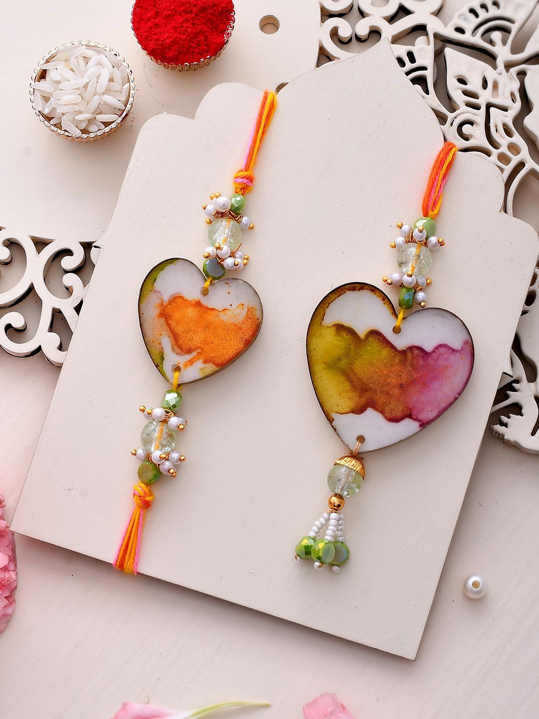 

Aapno Rajasthan Heart Shaped Bhaiya Bhabhi Rakhi With Roli Chawal & Greeting Card, Orange