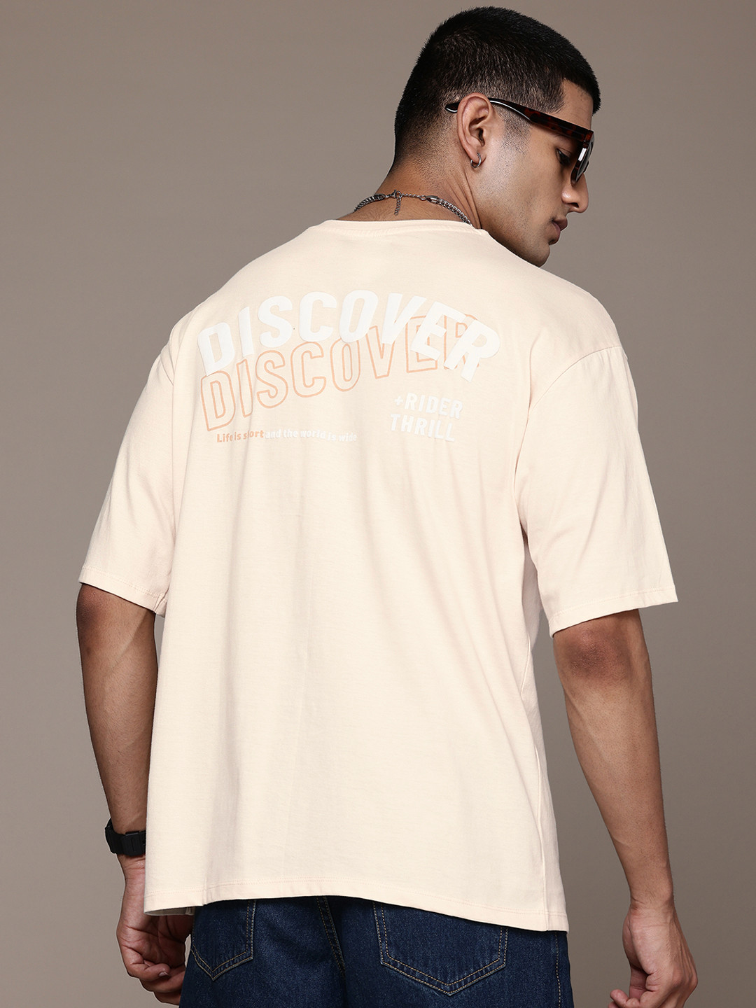 

The Roadster Lifestyle Co. Men Printed Pure Cotton Relaxed Fit T-shirt, Cream