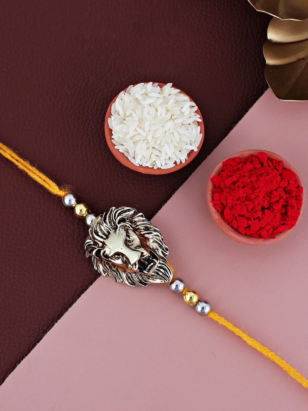 

LUCKY JEWELLERY Oxidised Lion Face Thread Rakhi With Roli Chawal & Greeting Card, Gold