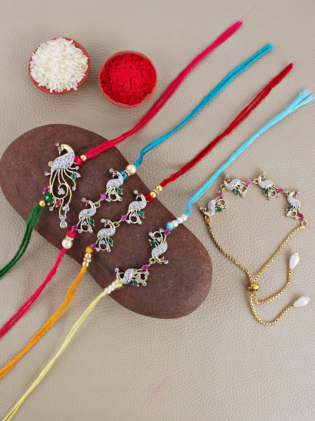 

LUCKY JEWELLERY Set Of 4 Thread And Lumba Bracelet Rakhis With Roli Chawal & Greeting Card, Gold