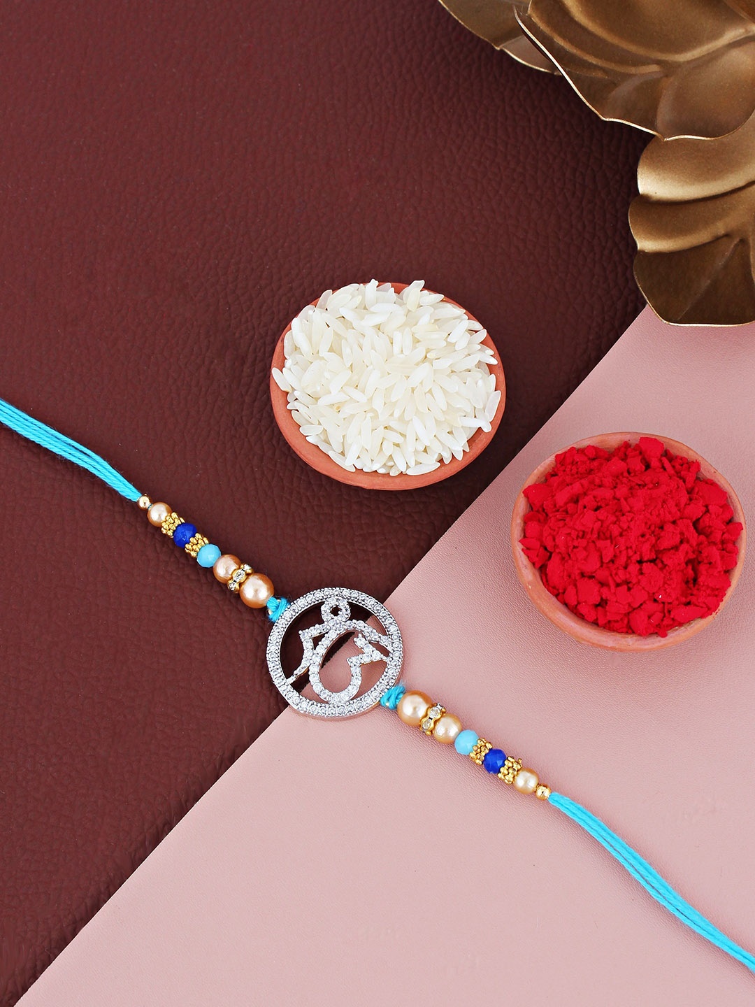 

LUCKY JEWELLERY Ik Onkar Sikh Gold Plated AD Stone-Studded Thread Rakhi, Silver