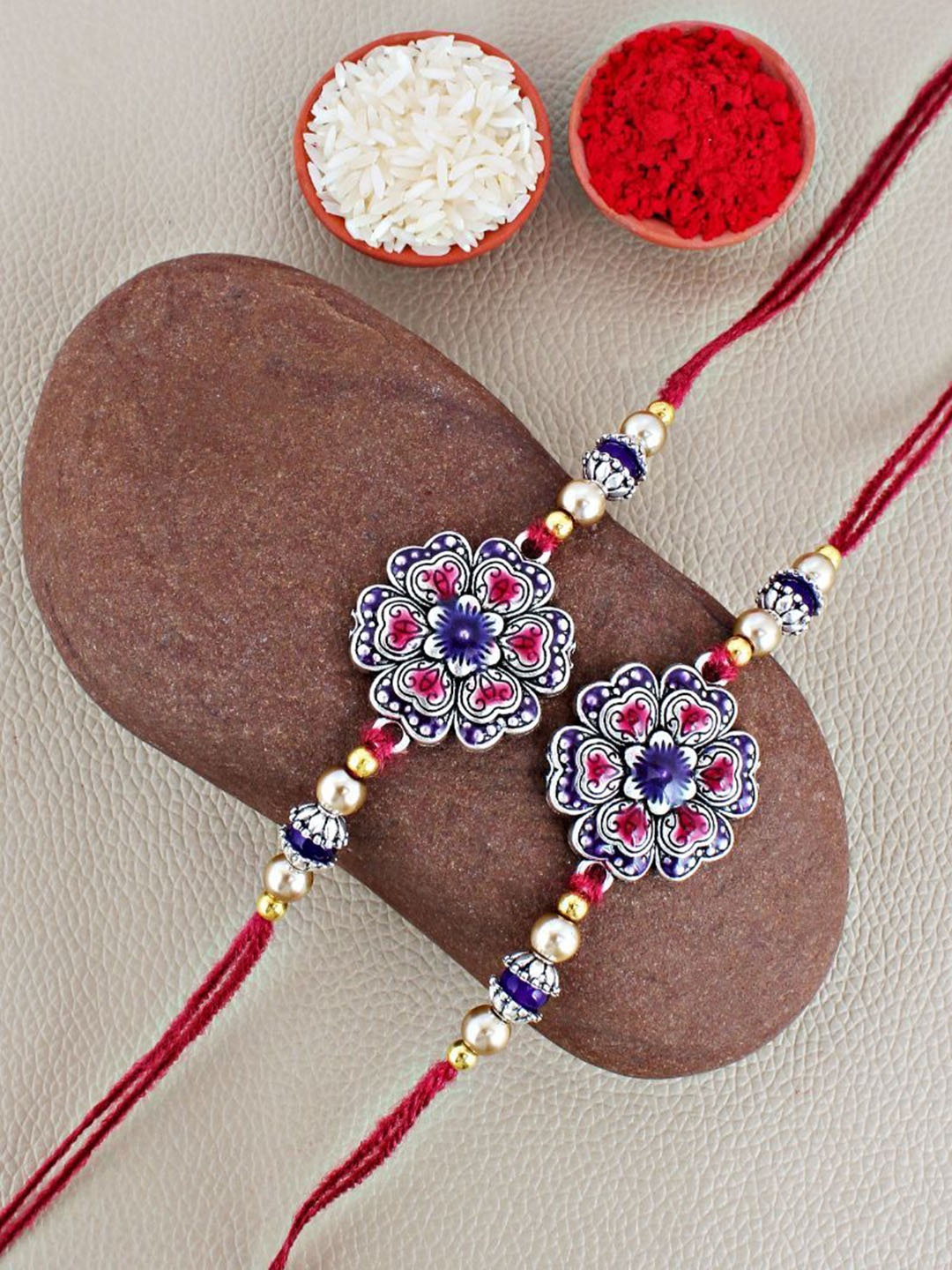 

LUCKY JEWELLERY Set Of 2 German Silver Meenakari Rakhis With Roli Chawal & Greeting Card