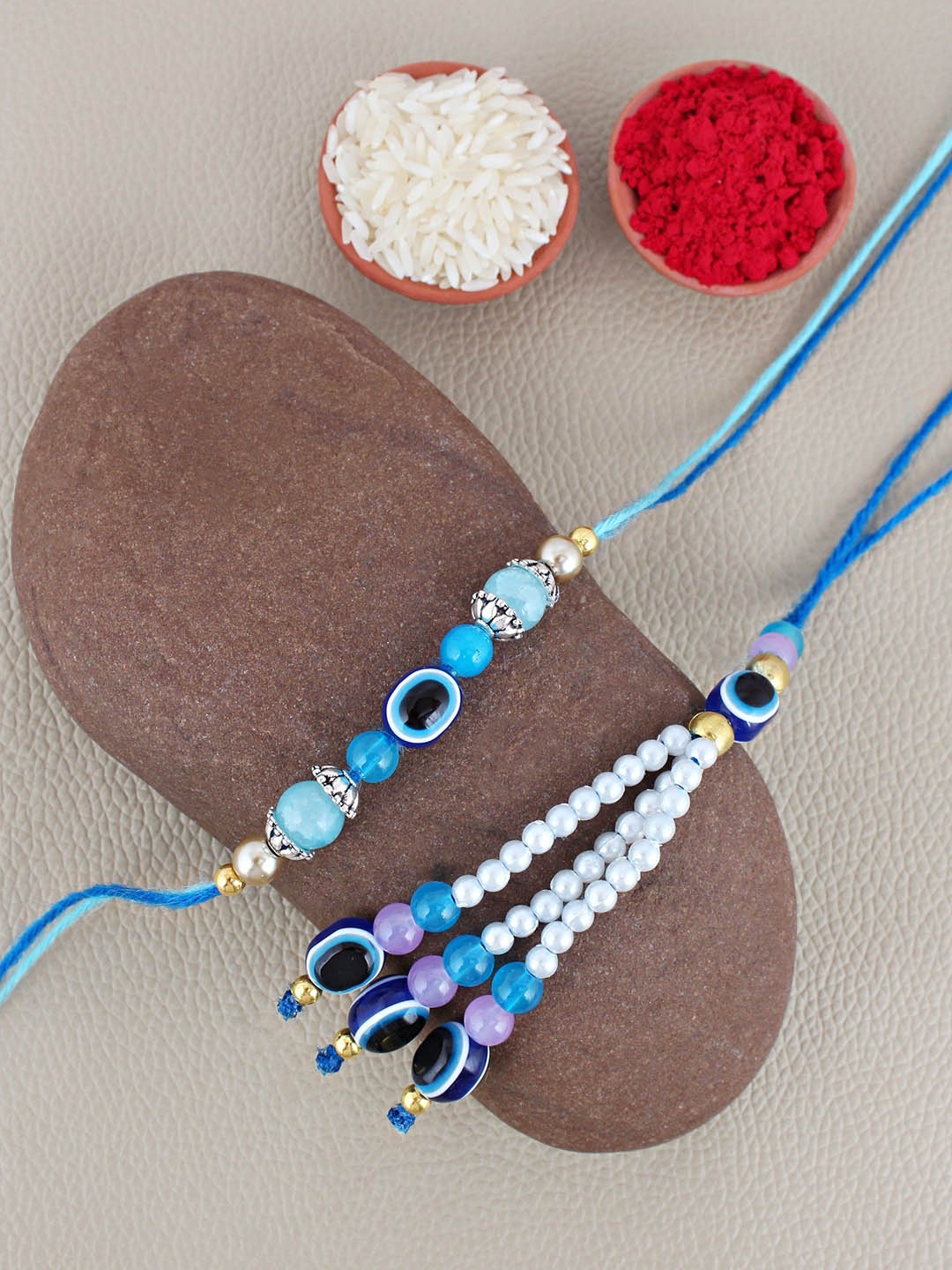 

LUCKY JEWELLERY Set Of 2 Evil Eye Beaded Lumba & Thread Rakhis With Roli Chawal, Silver