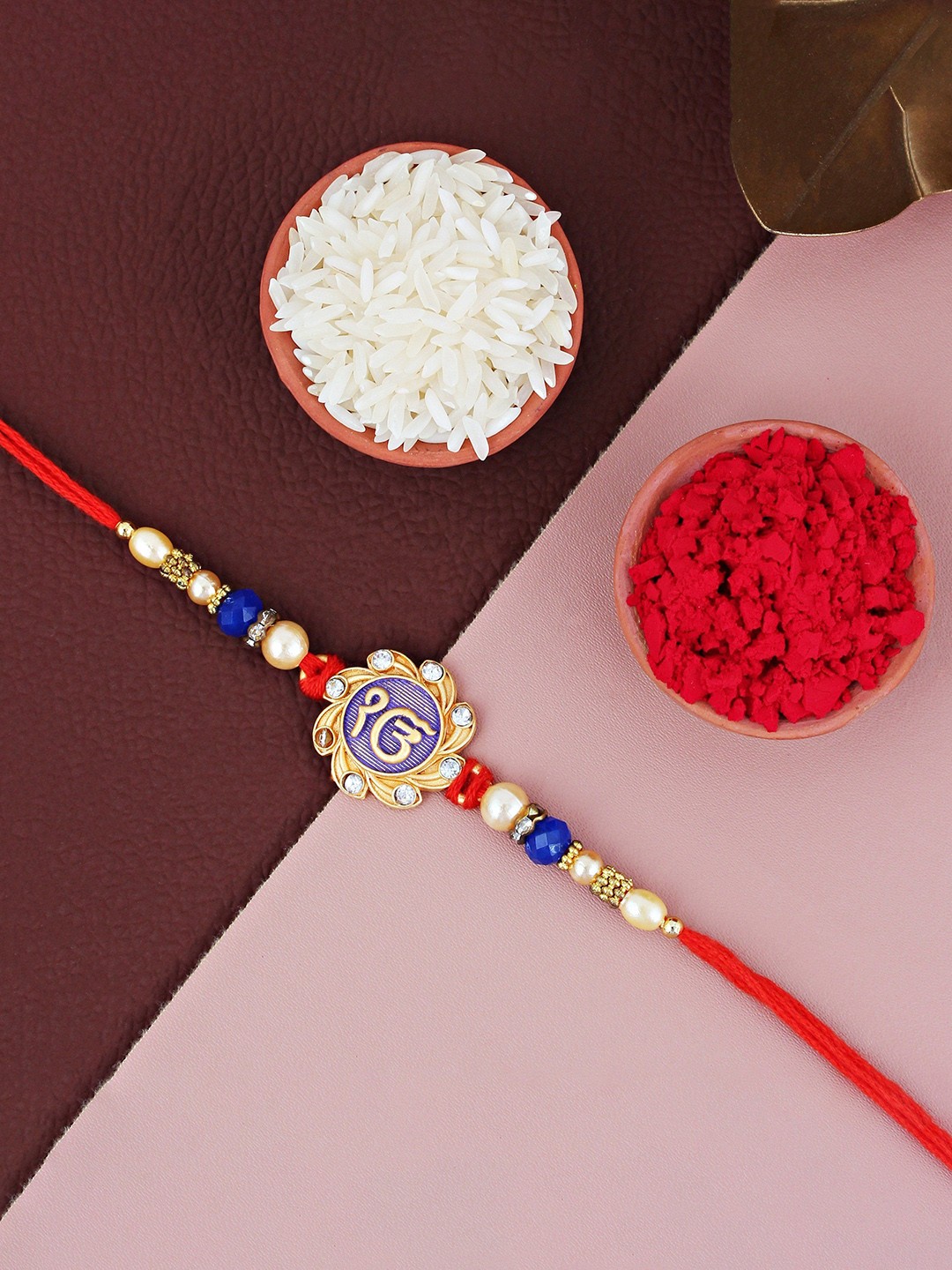 

LUCKY JEWELLERY Ik Onkar Sikh Thread Rakhi With Roli Chawal, Gold