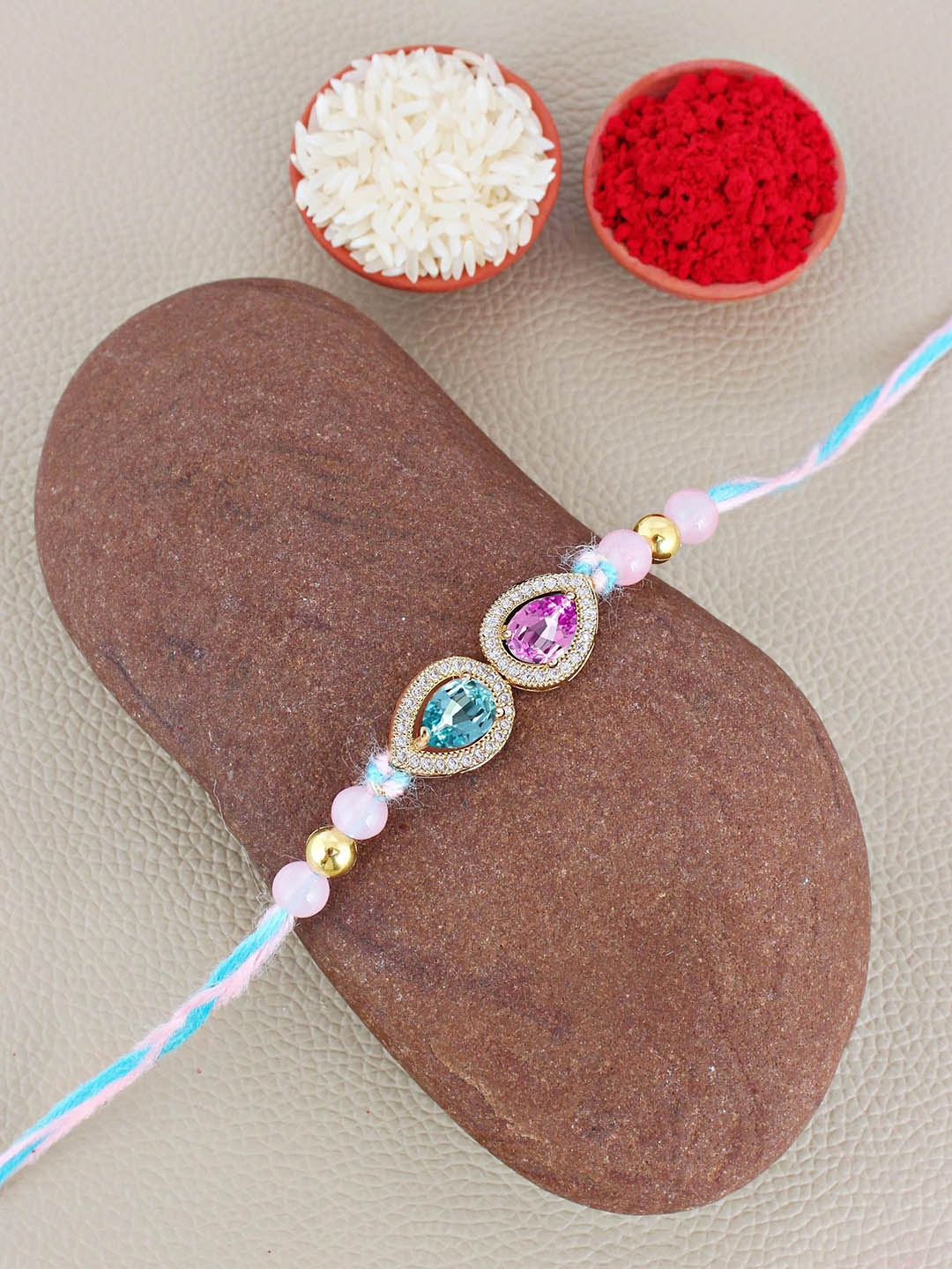 

LUCKY JEWELLERY Stone Studded & Beaded Thread Rakhi With Roli Chawal, Pink