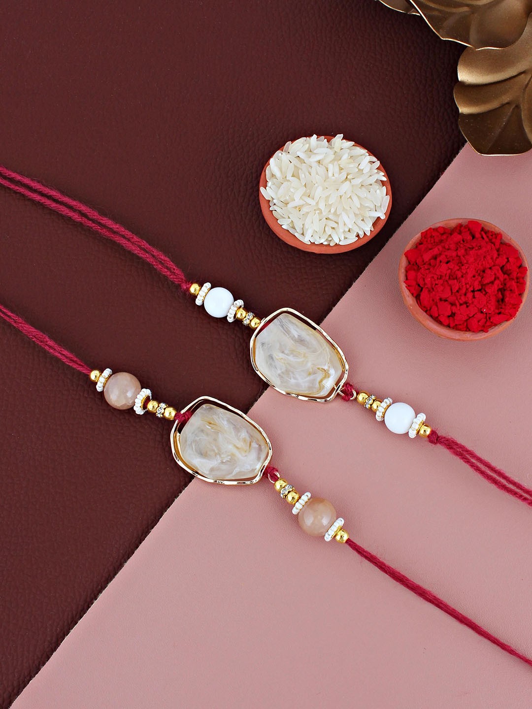 

LUCKY JEWELLERY Set Of 2 Semi Precious Stone Studded Thread Rakhis With Roli Chawal, Gold