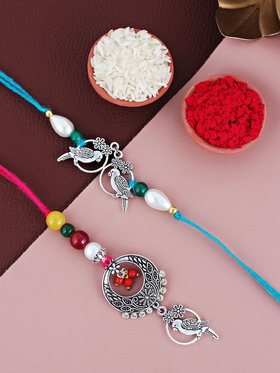 

LUCKY JEWELLERY Set Of 2 Oxidised Lumba & Thread Rakhis With Roli Chawal, Silver