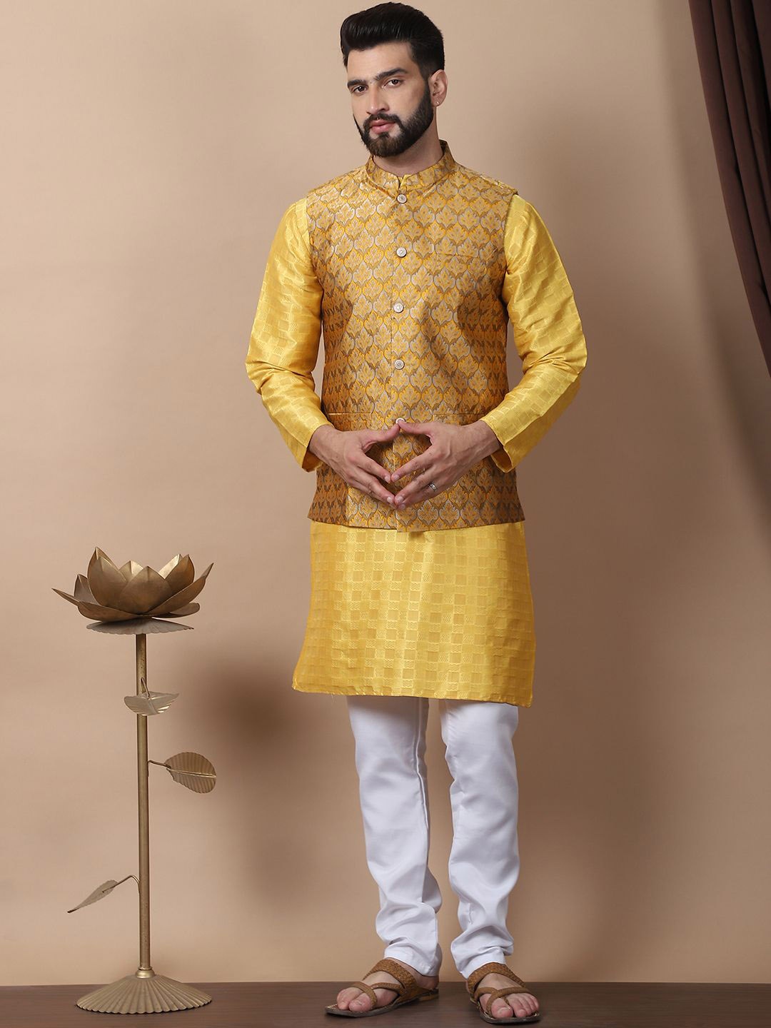 

Anouk Yellow Geometric Printed Mandarin Collar Kurta with Churidar & Nehru Jacket