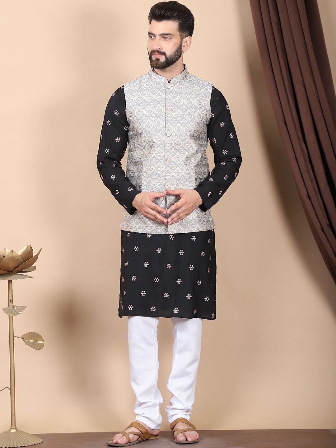 

Anouk Black Floral Embroidered Sequinned Cotton Silk Kurta with Churidar & Nehru Jacket