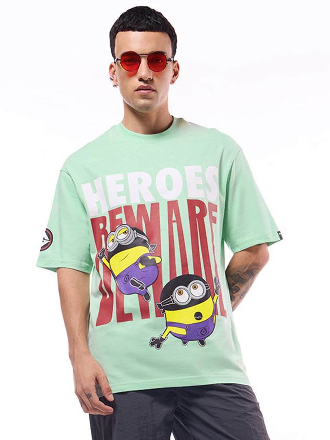 

Bewakoof Men Graphic Minions Printed Pure Cotton Oversized T-shirt, Green