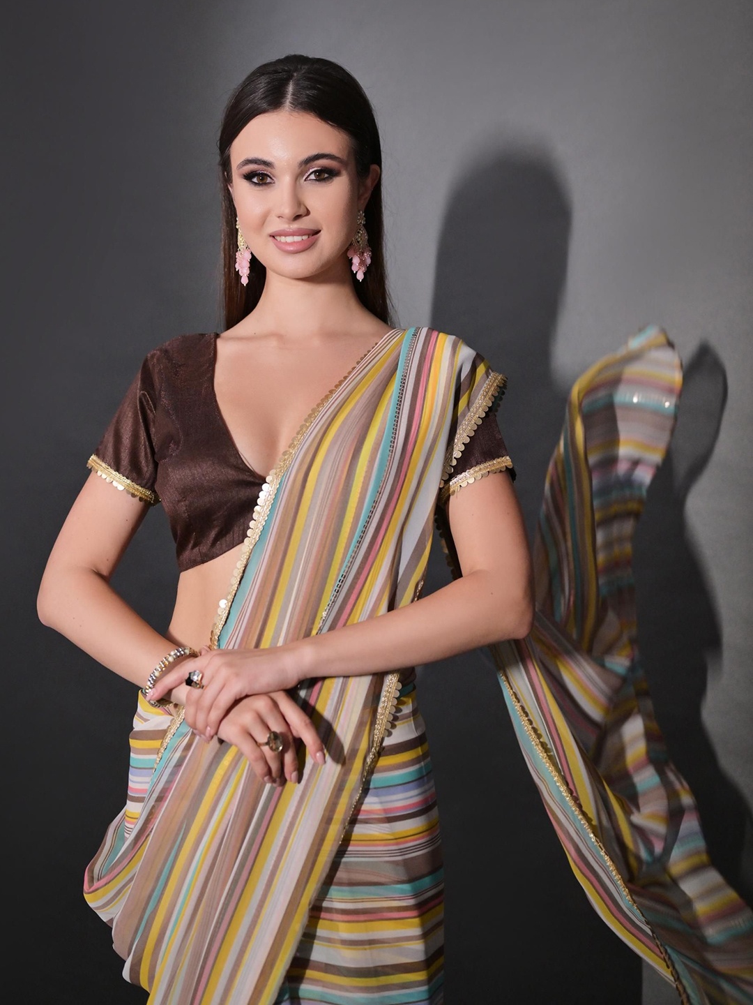 

Mitera Striped Sequinned Pure Georgette Saree, Blue