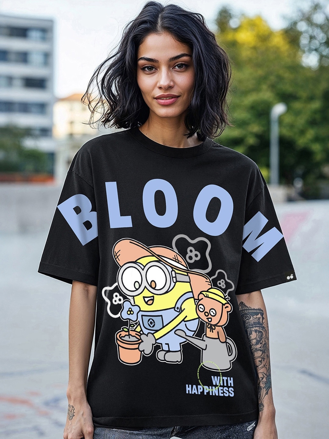 

Bewakoof Women Graphic Minions Printed Cotton Oversized T-shirt, Black