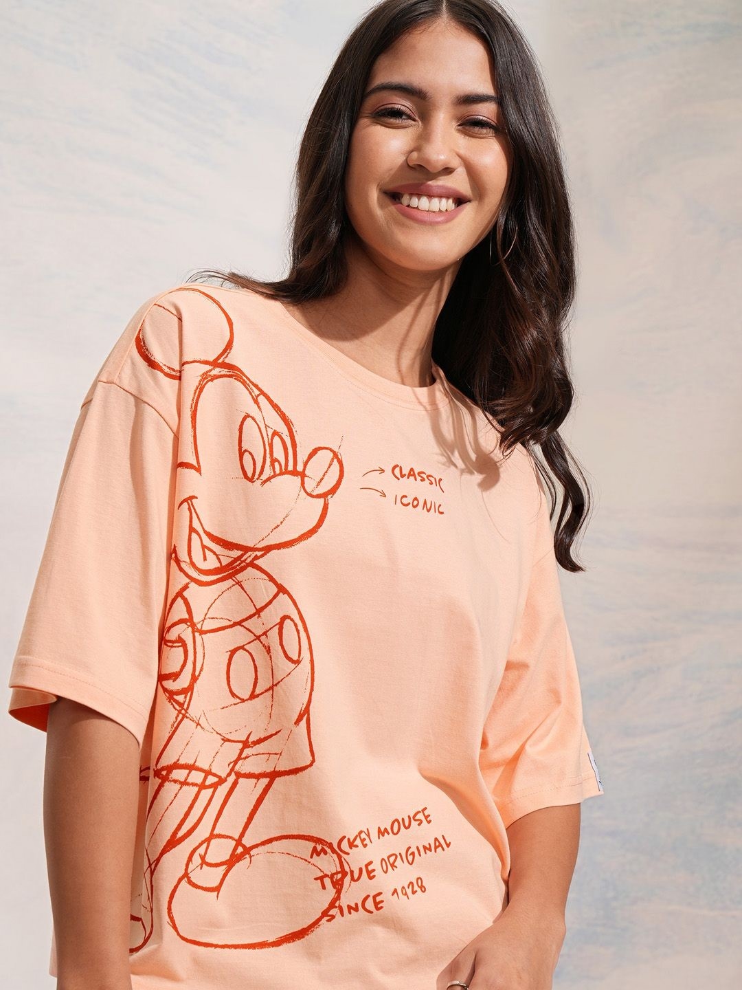 

Tokyo Talkies Women Mickey Mouse Printed Crop Oversized Tshirt, Peach