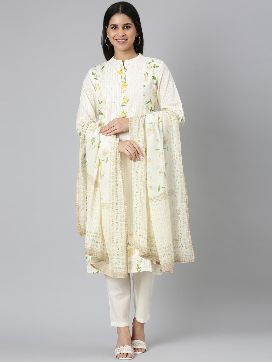 

Neerus Floral Printed Mandarin Collar Jute Cotton Straight Kurta with Trousers & Dupatta, Cream