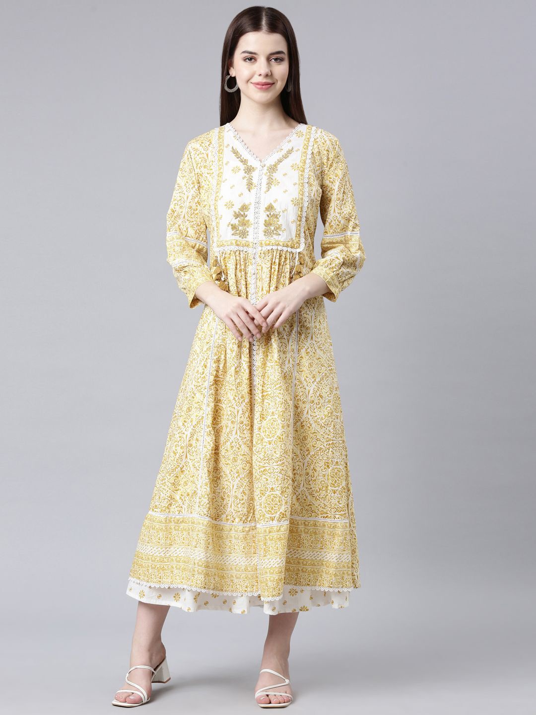 

Neerus Paisley Yoke Design Puff Sleeves Thread Work Anarkali Kurta, Mustard