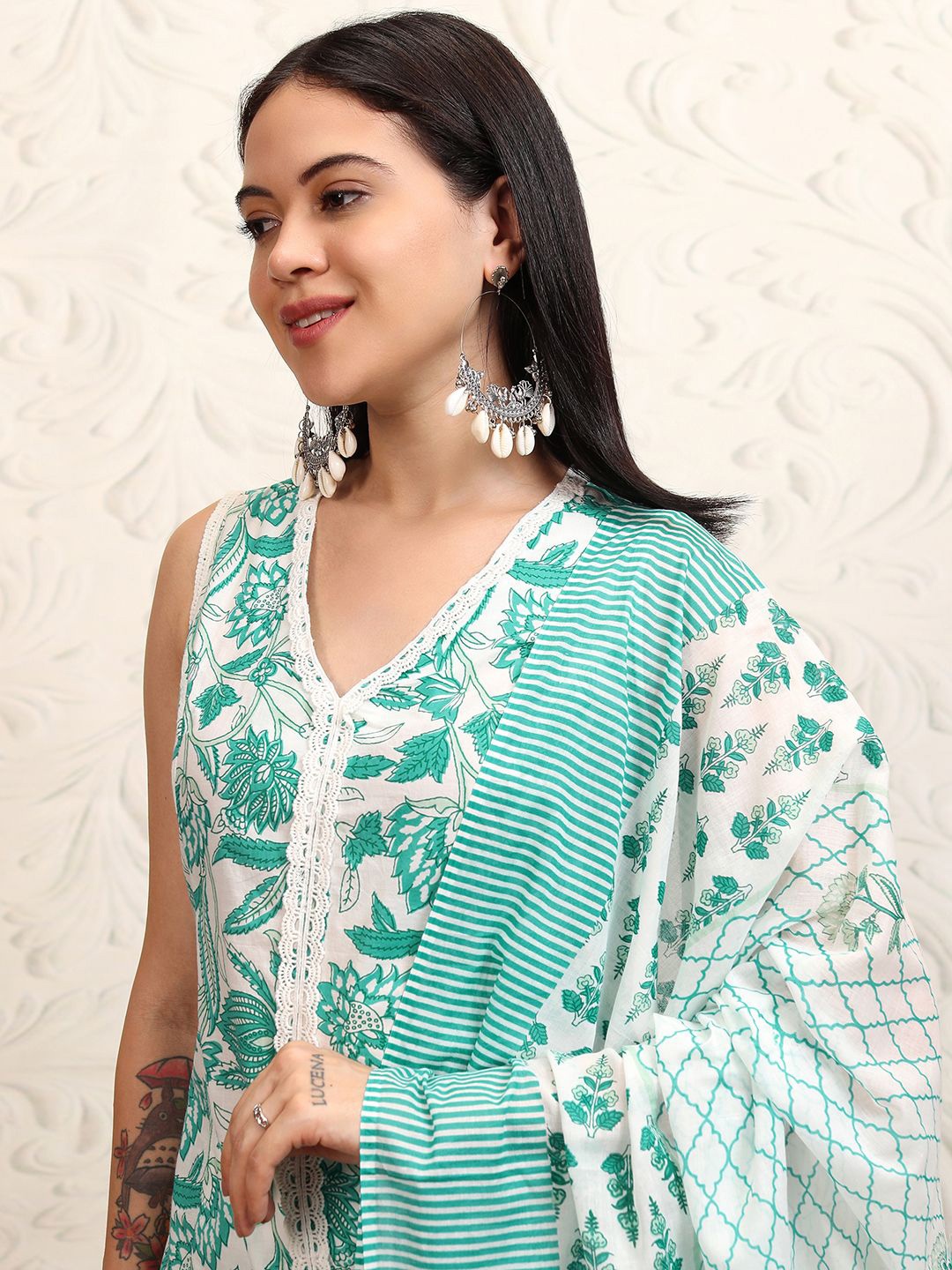 

Vishudh White Floral Printed Sleeveless Pure Cotton Straight Kurta With Trousers & Dupatta
