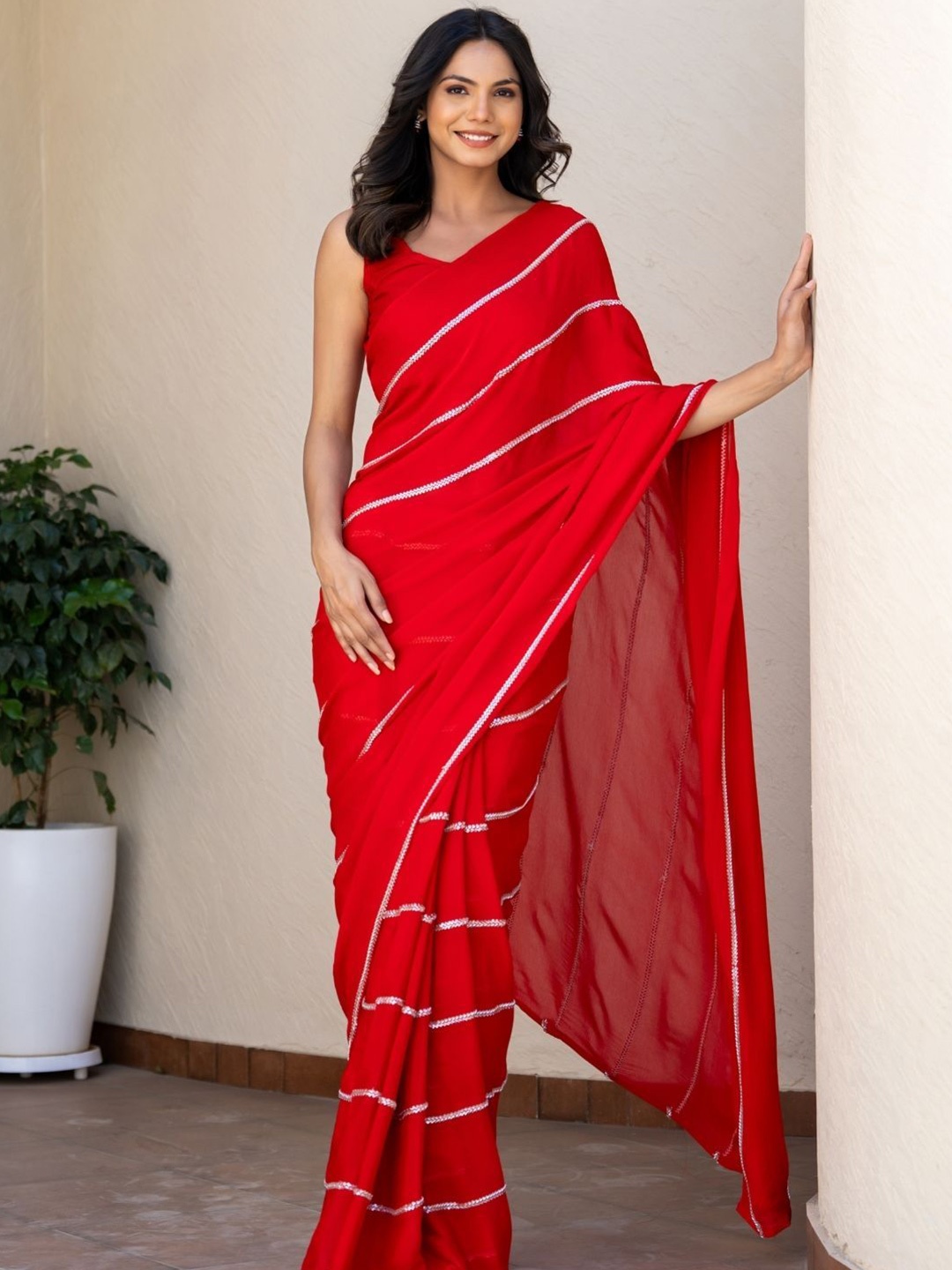 

HOUSE OF JAMOTI Striped Embroidered Saree, Red