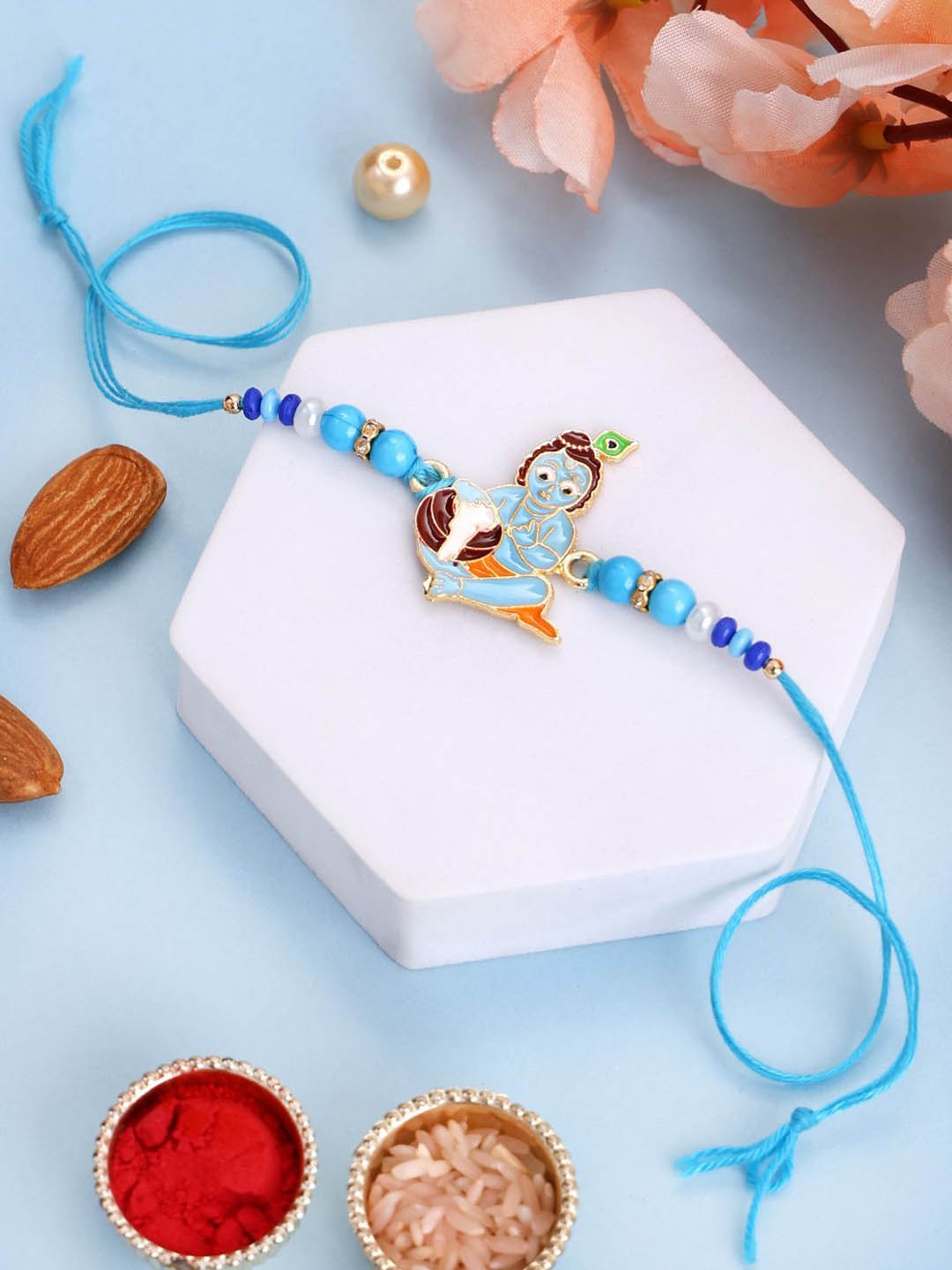 

PANASH Set Of 2 Gold Plated Lord Krishna Rakhi With Printed Mug & Roli Chawal