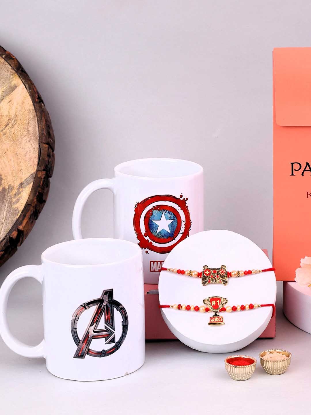 

PANASH Silver Plated Name of Bhai Shaped Beaded Rakhi With Gift Set Of Mug & Roli Chawal, Gold