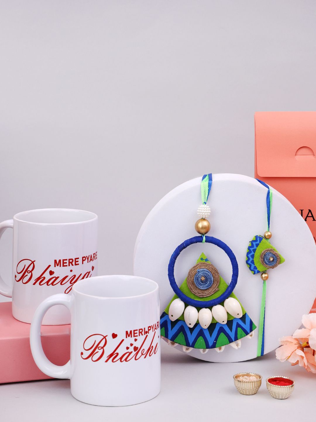 

PANASH Set Of 2 Beaded Thread Bhaiya Bhabhi Rakhis With Mugs & Roli Chawal, Gold