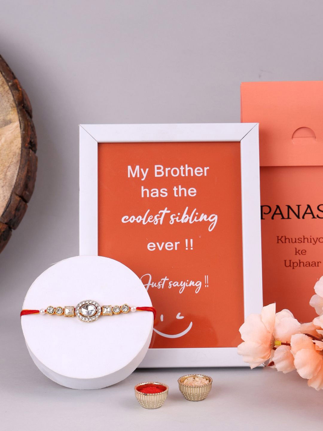 

PANASH Set Of 2 Gold-Plated CZ Stone Studded Beaded Rakhi With Photo Frame And Roli Chawal