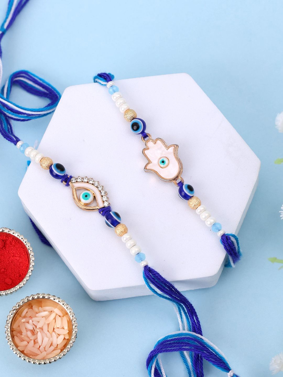

PANASH Set Of 4 Gold-Plated Evil Eye & Stone Studed Rakhis With Mugs And Roli Chawal