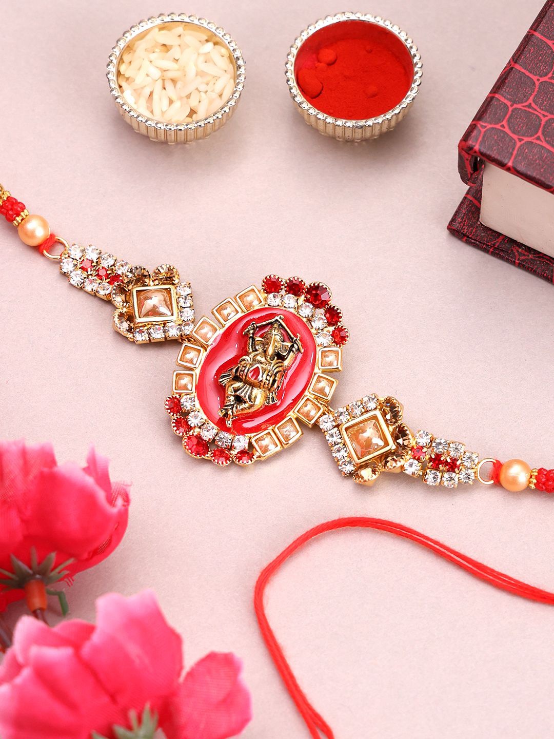 

PANASH Set Of 2 Gold-Plated Ganesh Thread Rakhi With Mug & Roli Chawal